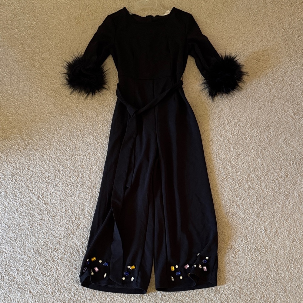Black Jumpsuit with Feather Cuffs and Embellished Hem
